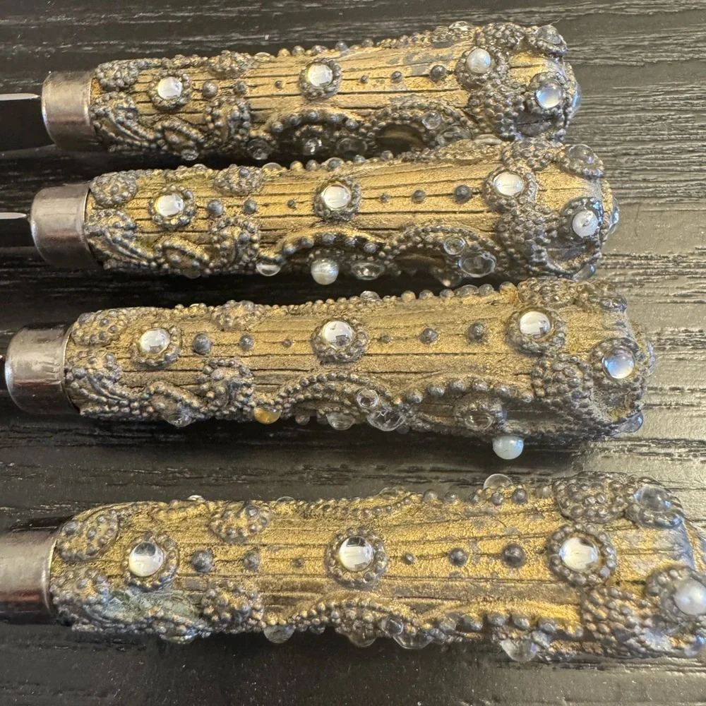 Vintage set of 4 ornate handled butter/cheese spread knives